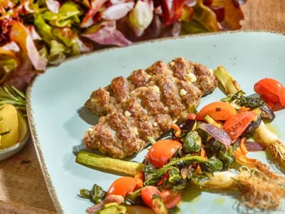 ‘Bifteki’, mincemeat product with diced white cheese,