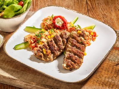 Köfte, beefmince product with vegetables and white cheese,
