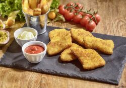 Partyschnitzel vom Schwein, ca. 25-30 g, flüssig gewürzt, paniert,